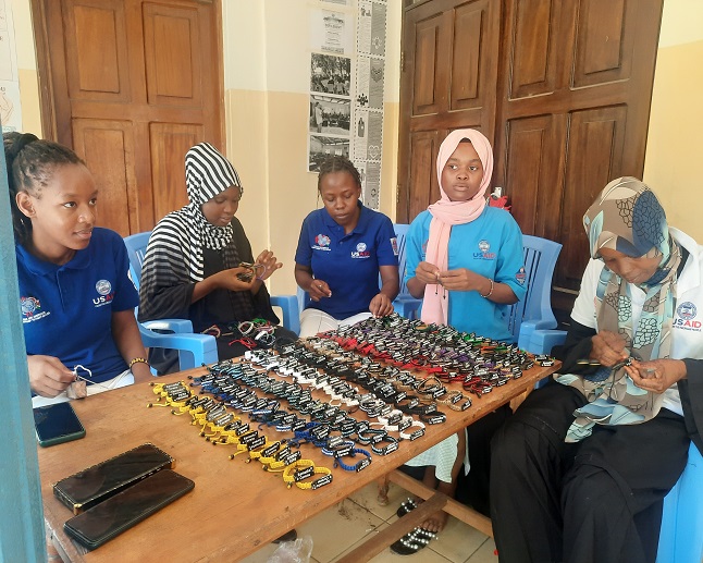 hazina group comprised of agyw graduants who were contracted to produce wristbands for the covid 19 demand creation